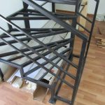 Stained beech staircase, metal structure