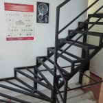 Stained beech staircase, metal structure